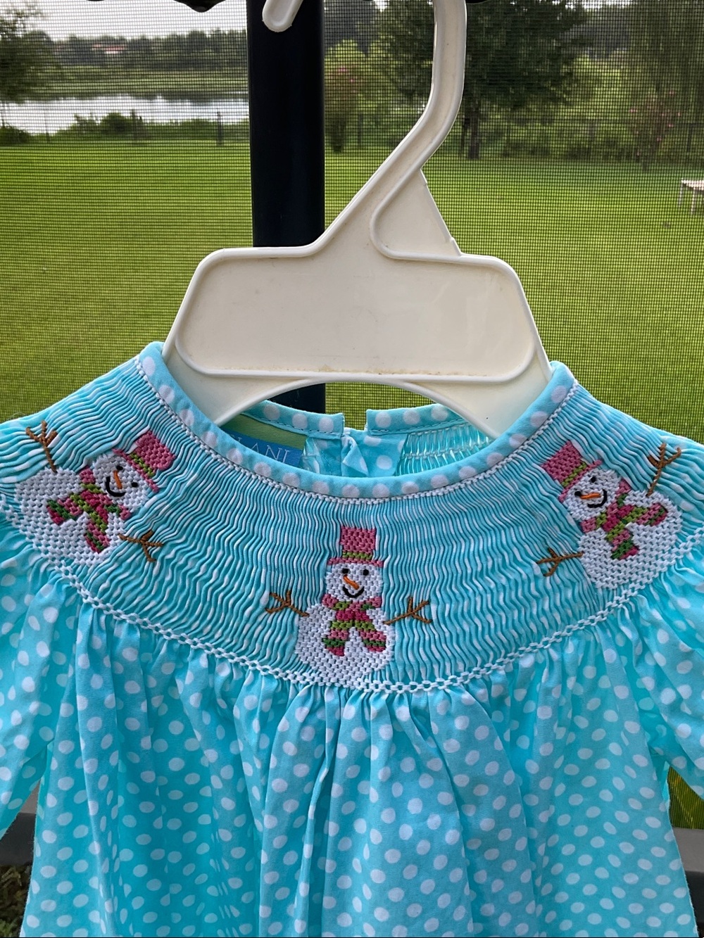 Turquoise Polka Dot Smocked Long-Sleeve Kids' Dress with Snowman Detail